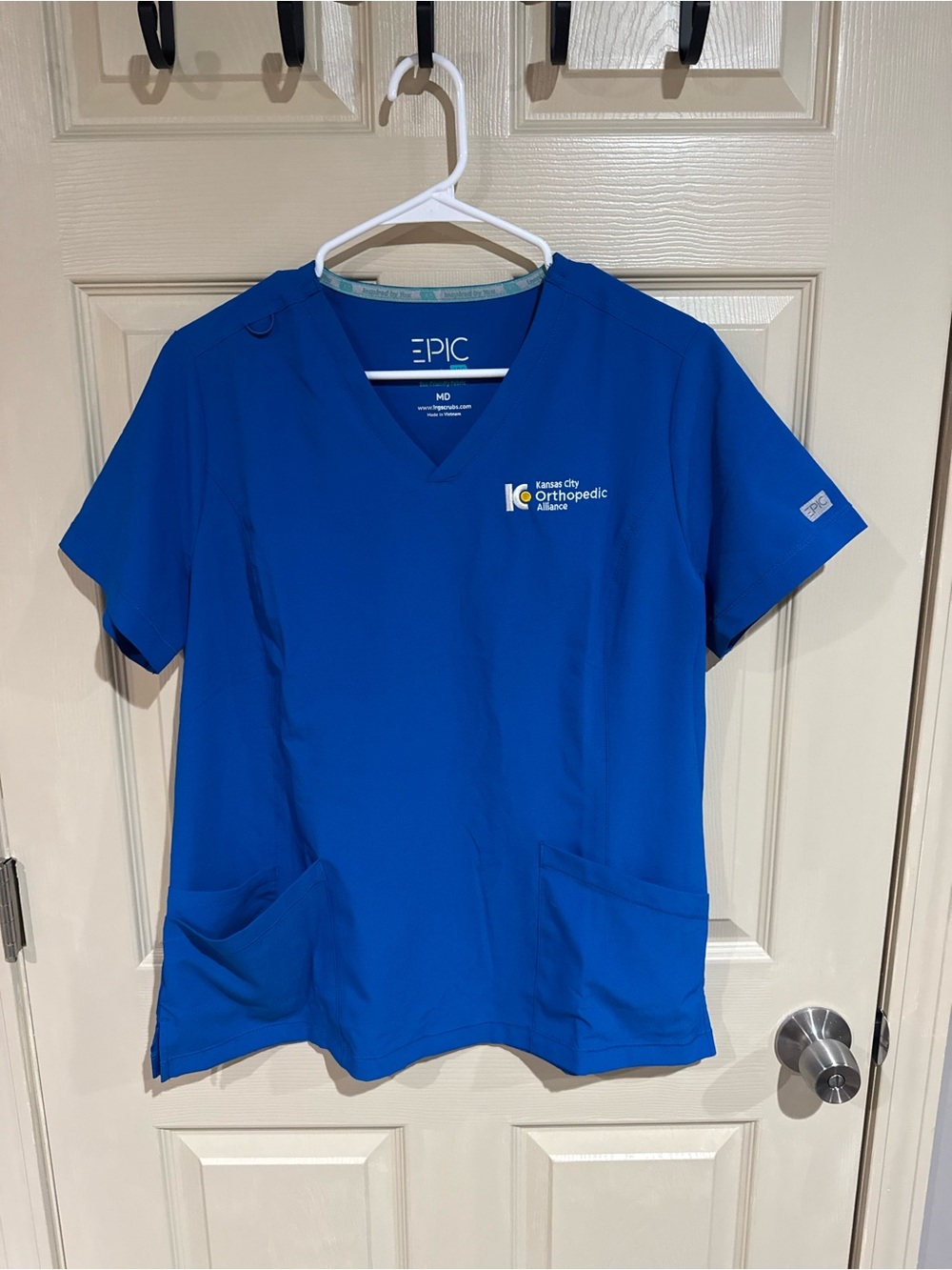 Women's V-neck Medical Scrub Top Royal Blue Kansas City Orthopedic Alliance KCOA